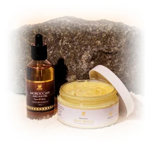 full view of organic argan oil dropper bottle & organic shea butter container open presenting prophetic blends body care bundle for the eu & uk