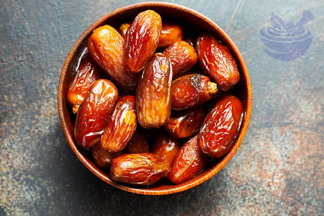close-up image of Dried Medjoul date fruit in a bowl