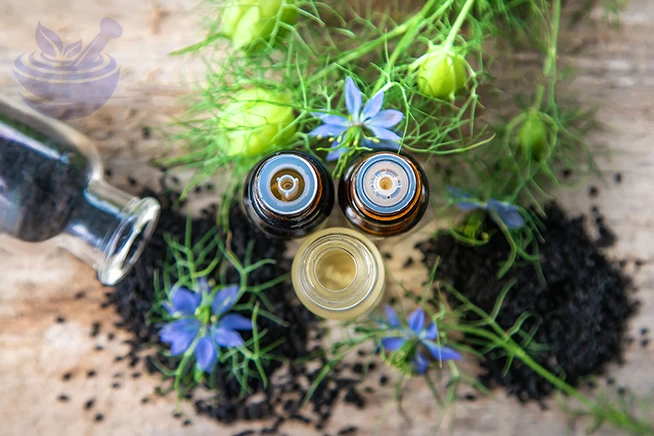 selective focus black cumin oil bottle showing the benefits of black seed oil gummies.
