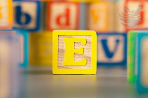 photograph of colorful wooden block letter e